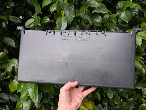 Frame feeder for inside the beehive. holds sugar syrup or other bee nutrition to maintain their health