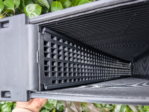 Frame feeder for inside the beehive. holds sugar syrup or other bee nutrition to maintain their health