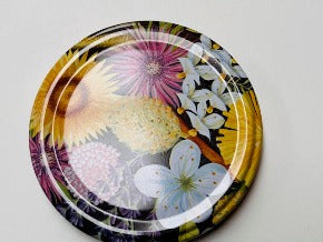 honey jar lids decorated with pictures of beautiful bees and bee inspire designs for australian honey and australian beekeeping for sale