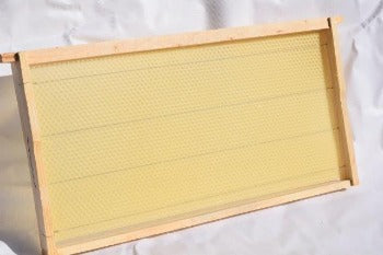 beeswax frame assembled with pure australian beeswax foundation.  assembled and ready to go for sale for australian beekeeping